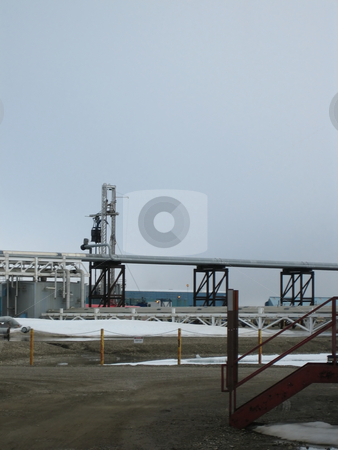 To use this stock image in your creative project, please select the size you need over to the right and click the "Add to Cart" button.
Your downloaded image will come with the Cutcaster watermark removed so don’t worry about the watermark you see on this page. Oil extraction site stock photo, Oil and petroleum extraction site including drilling wells and pipeline for transportation of crude oil by Albert Lozano