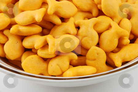 To use this stock image in your creative project, please select the size you need over to the right and click the "Add to Cart" button.
Your downloaded image will come with the Cutcaster watermark removed so don’t worry about the watermark you see on this page. Snacky foods stock photo, Stock pictures of crackers shaped like little fishies for snacks by Albert Lozano