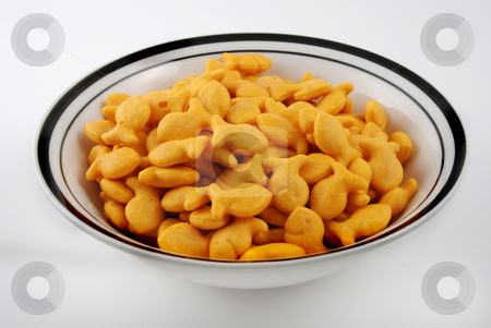 To use this stock image in your creative project, please select the size you need over to the right and click the "Add to Cart" button.
Your downloaded image will come with the Cutcaster watermark removed so don’t worry about the watermark you see on this page. Snacky foods stock photo, Stock pictures of crackers shaped like little fishies for snacks by Albert Lozano