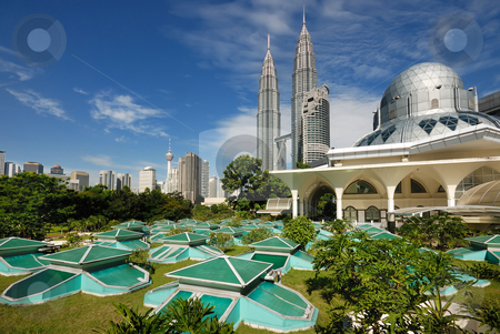To use this stock image in your creative project, please select the size you need over to the right and click the "Add to Cart" button.
Your downloaded image will come with the Cutcaster watermark removed so don’t worry about the watermark you see on this page. Kuala Lumpur Cityscape stock photo, Kuala Lumpur Cityscape with twin tower and mosque by Jaggat Images
