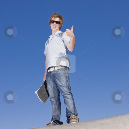 To use this stock image in your creative project, please select the size you need over to the right and click the "Add to Cart" button.
Your downloaded image will come with the Cutcaster watermark removed so don’t worry about the watermark you see on this page. Teen skater atop ramp stock photo, Teen skater stands atop ramp by Rick Becker-Leckrone