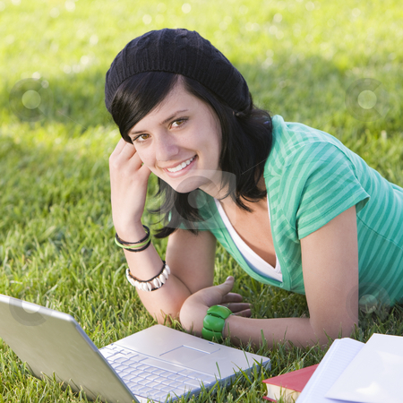 To use this stock image in your creative project, please select the size you need over to the right and click the "Add to Cart" button.
Your downloaded image will come with the Cutcaster watermark removed so don’t worry about the watermark you see on this page. Happy teen in car stock photo, Teen studies with laptop in grass and smiles by Rick Becker-Leckrone
