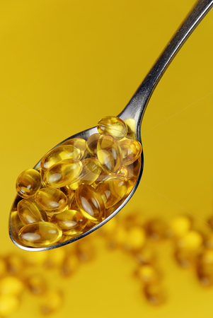 To use this stock image in your creative project, please select the size you need over to the right and click the "Add to Cart" button.
Your downloaded image will come with the Cutcaster watermark removed so don’t worry about the watermark you see on this page. Spoon full of medicine 01 stock photo, A spoon full of supplements set against yellow background by Paul Turner