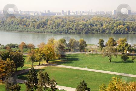 To use this stock image in your creative project, please select the size you need over to the right and click the "Add to Cart" button.
Your downloaded image will come with the Cutcaster watermark removed so don’t worry about the watermark you see on this page. River landscape Belgrade stock photo, General urban view of Danube in autumn colors in Belgrade by Julija Sapic
