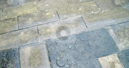 To use this stock image in your creative project, please select the size you need over to the right and click the "Add to Cart" button.
Your downloaded image will come with the Cutcaster watermark removed so don’t worry about the watermark you see on this page. Stone Pavement stock photo, Wet stone paving in the courtyard of a historical basilica by Serda Yilmaz