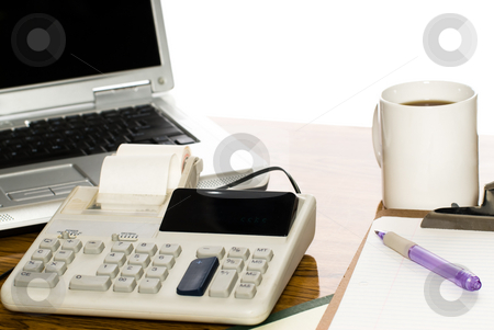 To use this stock image in your creative project, please select the size you need over to the right and click the "Add to Cart" button.
Your downloaded image will come with the Cutcaster watermark removed so don’t worry about the watermark you see on this page. Isolated Office Desk stock photo, An office desk with a cup of coffee, a calculator and a laptop, isolated against a white background by Richard Nelson