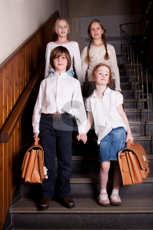 To use this stock image in your creative project, please select the size you need over to the right and click the "Add to Cart" button.
Your downloaded image will come with the Cutcaster watermark removed so don’t worry about the watermark you see on this page. Kids in format stock photo, Group of little students with different ageson the stairs by Frenk and Danielle Kaufmann