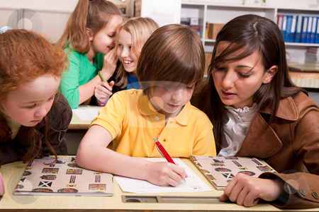 To use this stock image in your creative project, please select the size you need over to the right and click the "Add to Cart" button.
Your downloaded image will come with the Cutcaster watermark removed so don’t worry about the watermark you see on this page. The teacher helps stock photo, Group of little students with different ages in a classroom by Frenk and Danielle Kaufmann