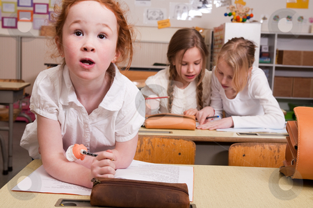 To use this stock image in your creative project, please select the size you need over to the right and click the "Add to Cart" button.
Your downloaded image will come with the Cutcaster watermark removed so don’t worry about the watermark you see on this page. With my face in the camera stock photo, Group of little students with different ages in a classroom by Frenk and Danielle Kaufmann
