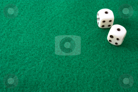 To use this stock image in your creative project, please select the size you need over to the right and click the "Add to Cart" button.
Your downloaded image will come with the Cutcaster watermark removed so don’t worry about the watermark you see on this page. Rolled Snake Eyes stock photo, Dice rolled to snake eyes, or double ones, on a green felt table by Terry McClary