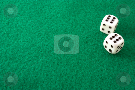 To use this stock image in your creative project, please select the size you need over to the right and click the "Add to Cart" button.
Your downloaded image will come with the Cutcaster watermark removed so don’t worry about the watermark you see on this page. Double Sixes stock photo, Dice rolled to double sizes on a green felt table by Terry McClary