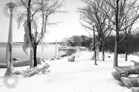 To use this stock image in your creative project, please select the size you need over to the right and click the "Add to Cart" button.
Your downloaded image will come with the Cutcaster watermark removed so don’t worry about the watermark you see on this page. After the snowstorm. stock photo, The lake shore on lake Ontario after a heavy snow and ice storm. by Horst Petzold