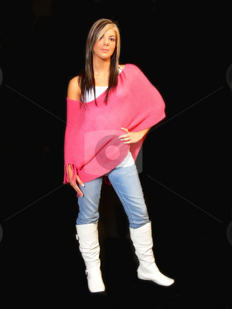 To use this stock image in your creative project, please select the size you need over to the right and click the "Add to Cart" button.
Your downloaded image will come with the Cutcaster watermark removed so don’t worry about the watermark you see on this page. Young lady in jeans. stock photo, An young lady in jeans and a pink top standing for black background
and white boots. by Horst Petzold