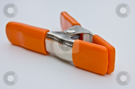To use this stock image in your creative project, please select the size you need over to the right and click the "Add to Cart" button.
Your downloaded image will come with the Cutcaster watermark removed so don’t worry about the watermark you see on this page. Orange Clamp Isolated on White Background stock photo, Bright orange clamp front view is isolated on a white background. by Valerie Garner