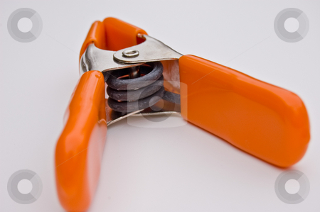To use this stock image in your creative project, please select the size you need over to the right and click the "Add to Cart" button.
Your downloaded image will come with the Cutcaster watermark removed so don’t worry about the watermark you see on this page. Bright Orange Clamp Isolated on White Background stock photo, This is a closeup of a bright orange clamp isolated on a white background, looking into the spring coil. by Valerie Garner