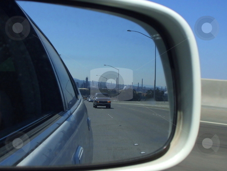 To use this stock image in your creative project, please select the size you need over to the right and click the "Add to Cart" button.
Your downloaded image will come with the Cutcaster watermark removed so don’t worry about the watermark you see on this page. Side Mirror View stock photo, by Michael Felix