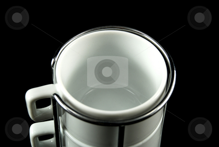 To use this stock image in your creative project, please select the size you need over to the right and click the "Add to Cart" button.
Your downloaded image will come with the Cutcaster watermark removed so don’t worry about the watermark you see on this page. Cofee cups stock photo, Stock pictures of coffee cups stacked for storage and usage by Albert Lozano