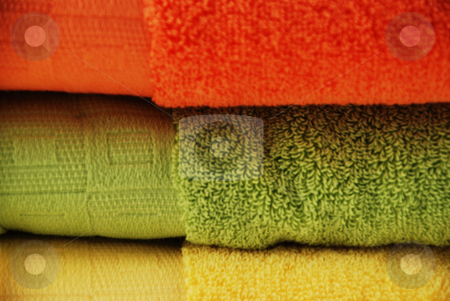 To use this stock image in your creative project, please select the size you need over to the right and click the "Add to Cart" button.
Your downloaded image will come with the Cutcaster watermark removed so don’t worry about the watermark you see on this page. Bath towels stock photo, Stock pictures of colorful bath towels stacked by Albert Lozano