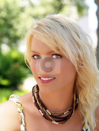 To use this stock image in your creative project, please select the size you need over to the right and click the "Add to Cart" button.
Your downloaded image will come with the Cutcaster watermark removed so don’t worry about the watermark you see on this page. Pretty young blond teen girl outdoor portrait stock photo, Portrait of pretty young blond teen girl by Jeff Cleveland