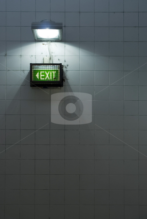 To use this stock image in your creative project, please select the size you need over to the right and click the "Add to Cart" button.
Your downloaded image will come with the Cutcaster watermark removed so don’t worry about the watermark you see on this page. The Exit stock photo, A grungy subway exit sign on a tiled wall by Stephen Gibson