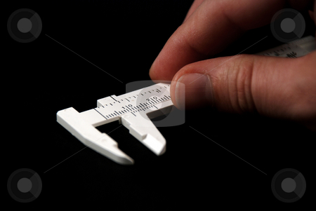 To use this stock image in your creative project, please select the size you need over to the right and click the "Add to Cart" button.
Your downloaded image will come with the Cutcaster watermark removed so don’t worry about the watermark you see on this page. Calipers stock photo, Stock pictures of white calipers for measuring by Albert Lozano