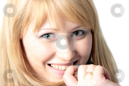 To use this stock image in your creative project, please select the size you need over to the right and click the "Add to Cart" button.
Your downloaded image will come with the Cutcaster watermark removed so don’t worry about the watermark you see on this page. Young woman closeup stock photo, Closeup portrait of smiling blond woman by Natalia Macheda