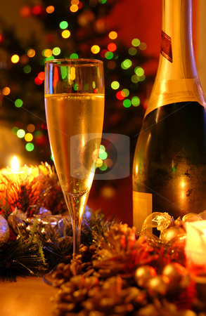 To use this stock image in your creative project, please select the size you need over to the right and click the "Add to Cart" button.
Your downloaded image will come with the Cutcaster watermark removed so don’t worry about the watermark you see on this page. New year champagne stock photo, Glass of champagne and bottle over new year tree by Julija Sapic
