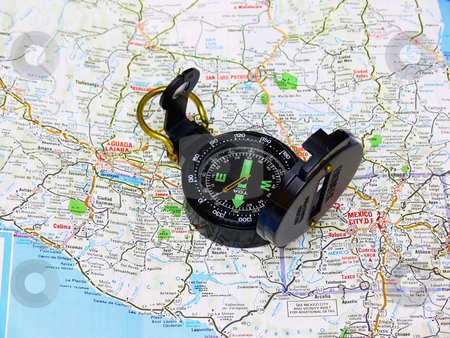 To use this stock image in your creative project, please select the size you need over to the right and click the "Add to Cart" button.
Your downloaded image will come with the Cutcaster watermark removed so don’t worry about the watermark you see on this page. Map with compass. stock photo, A map from Mexico with an compass in preparation for an trip to south
America. by Horst Petzold