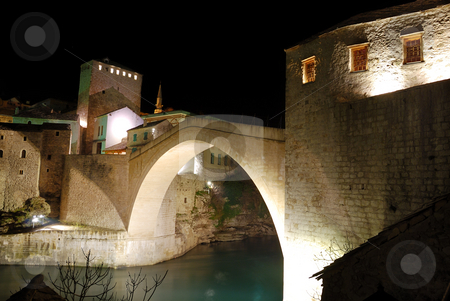 To use this stock image in your creative project, please select the size you need over to the right and click the "Add to Cart" button.
Your downloaded image will come with the Cutcaster watermark removed so don’t worry about the watermark you see on this page. Mostar Old Bridge With Towers at Night stock photo, Old Bridge in Mostar at night reconstructed in 2003 after the original from 1556. by Denis Radovanovic