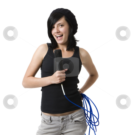 To use this stock image in your creative project, please select the size you need over to the right and click the "Add to Cart" button.
Your downloaded image will come with the Cutcaster watermark removed so don’t worry about the watermark you see on this page. Girl sings stock photo, A girl sings into a mic by Rick Becker-Leckrone