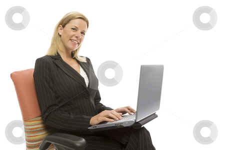 To use this stock image in your creative project, please select the size you need over to the right and click the "Add to Cart" button.
Your downloaded image will come with the Cutcaster watermark removed so don’t worry about the watermark you see on this page. Businesswoman sits with laptop stock photo, Businesswoman in a suit sits in a chair with a laptop by Rick Becker-Leckrone