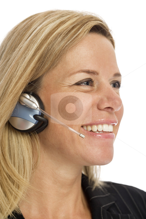 To use this stock image in your creative project, please select the size you need over to the right and click the "Add to Cart" button.
Your downloaded image will come with the Cutcaster watermark removed so don’t worry about the watermark you see on this page. Businesswoman with headset stock photo, Businesswoman uses a headset and smiles against a white background by Rick Becker-Leckrone