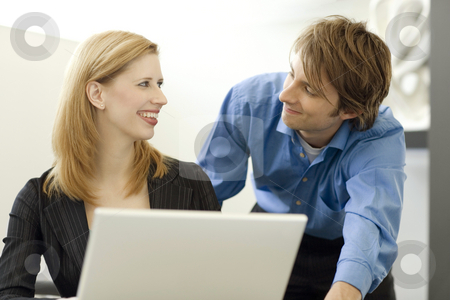 To use this stock image in your creative project, please select the size you need over to the right and click the "Add to Cart" button.
Your downloaded image will come with the Cutcaster watermark removed so don’t worry about the watermark you see on this page. Workers share a computer stock photo, Workers talk while sharing a computer by Rick Becker-Leckrone