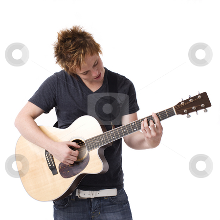 To use this stock image in your creative project, please select the size you need over to the right and click the "Add to Cart" button.
Your downloaded image will come with the Cutcaster watermark removed so don’t worry about the watermark you see on this page. Boy plays guitar stock photo, A boy plays his guitar by Rick Becker-Leckrone