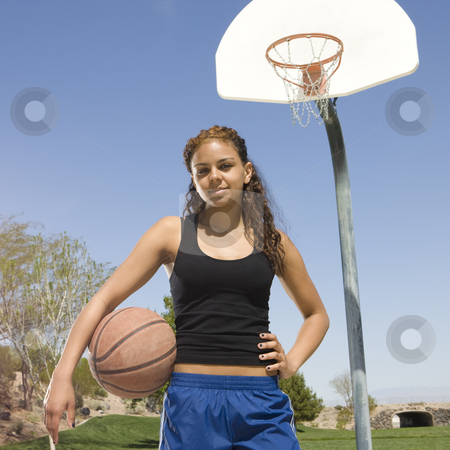 To use this stock image in your creative project, please select the size you need over to the right and click the "Add to Cart" button.
Your downloaded image will come with the Cutcaster watermark removed so don’t worry about the watermark you see on this page. Teen girl with basketball stock photo, Teen girl with basketball hangs out at the park by Rick Becker-Leckrone