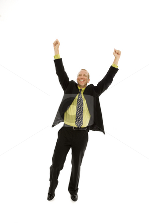 To use this stock image in your creative project, please select the size you need over to the right and click the "Add to Cart" button.
Your downloaded image will come with the Cutcaster watermark removed so don’t worry about the watermark you see on this page. Businessman expresses triumph stock photo, Businessman in a suit raises his arms in triumph by Rick Becker-Leckrone
