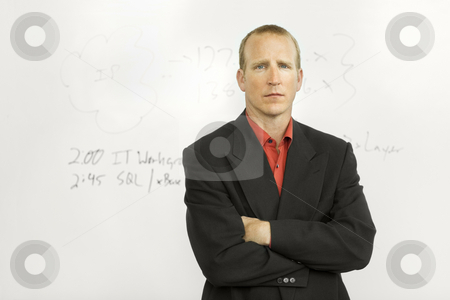 To use this stock image in your creative project, please select the size you need over to the right and click the "Add to Cart" button.
Your downloaded image will come with the Cutcaster watermark removed so don’t worry about the watermark you see on this page. Businessman with writing board stock photo, Businessman stands in front of writing board by Rick Becker-Leckrone