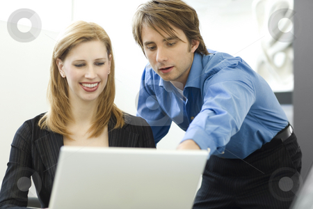 To use this stock image in your creative project, please select the size you need over to the right and click the "Add to Cart" button.
Your downloaded image will come with the Cutcaster watermark removed so don’t worry about the watermark you see on this page. Workers share a computer stock photo, Workers talk while using a laptop computer by Rick Becker-Leckrone