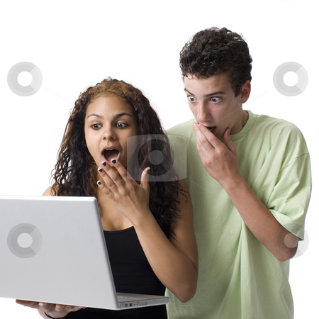 To use this stock image in your creative project, please select the size you need over to the right and click the "Add to Cart" button.
Your downloaded image will come with the Cutcaster watermark removed so don’t worry about the watermark you see on this page. Shocked kids with laptop stock photo, Two kids gesture surprise as they look at a laptop by Rick Becker-Leckrone