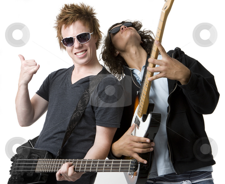 To use this stock image in your creative project, please select the size you need over to the right and click the "Add to Cart" button.
Your downloaded image will come with the Cutcaster watermark removed so don’t worry about the watermark you see on this page. Two guys rock out stock photo, Two guys rock out with guitars by Rick Becker-Leckrone