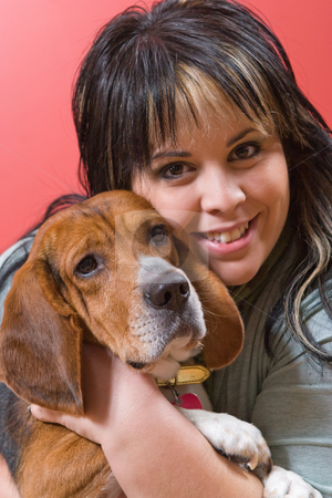 To use this stock image in your creative project, please select the size you need over to the right and click the "Add to Cart" button.
Your downloaded image will come with the Cutcaster watermark removed so don’t worry about the watermark you see on this page. Girl And Her Dog stock photo, A pretty young woman posing with her beagle pup. Shallow depth of field. by Todd Arena