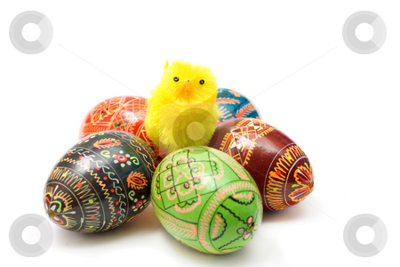 To use this stock image in your creative project, please select the size you need over to the right and click the "Add to Cart" button.
Your downloaded image will come with the Cutcaster watermark removed so don’t worry about the watermark you see on this page. Easter theme stock photo, Funny toy chicken among colorful Easter eggs isolated on white by Natalia Macheda