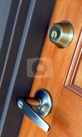 To use this stock image in your creative project, please select the size you need over to the right and click the "Add to Cart" button.
Your downloaded image will come with the Cutcaster watermark removed so don’t worry about the watermark you see on this page. Lever security handle and lock stock photo, Contempoary lever door handle and deadbolt lock by Jill Reid