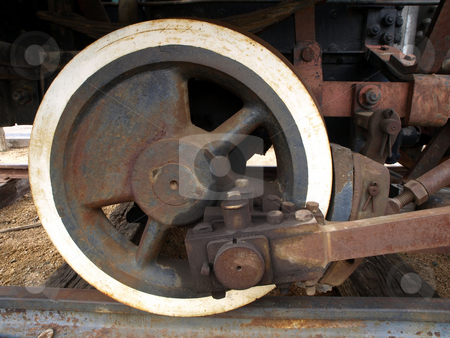 To use this stock image in your creative project, please select the size you need over to the right and click the "Add to Cart" button.
Your downloaded image will come with the Cutcaster watermark removed so don’t worry about the watermark you see on this page. Close-up of antique train wheel stock photo, Close-up of vintage and antique rusted train wheel by Jill Reid