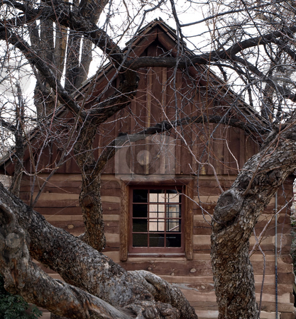To use this stock image in your creative project, please select the size you need over to the right and click the "Add to Cart" button.
Your downloaded image will come with the Cutcaster watermark removed so don’t worry about the watermark you see on this page. Log cabin through the trees stock photo, View of an authentic log cabin through tree branches by Jill Reid