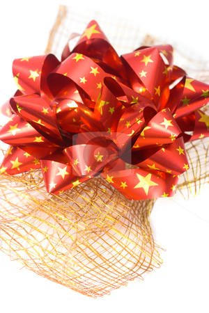 To use this stock image in your creative project, please select the size you need over to the right and click the "Add to Cart" button.
Your downloaded image will come with the Cutcaster watermark removed so don’t worry about the watermark you see on this page. Red bow stock photo, Red bow on decorative golden wire net isolated on white by Natalia Macheda