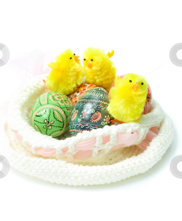 To use this stock image in your creative project, please select the size you need over to the right and click the "Add to Cart" button.
Your downloaded image will come with the Cutcaster watermark removed so don’t worry about the watermark you see on this page. Easter theme stock photo, Easter colorful eggs and funny toy chickens in nest-bonnet by Natalia Macheda