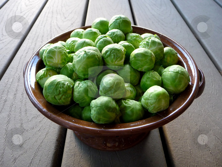 To use this stock image in your creative project, please select the size you need over to the right and click the "Add to Cart" button.
Your downloaded image will come with the Cutcaster watermark removed so don’t worry about the watermark you see on this page. Fresh brussels sprouts in metal bowl stock photo, A bowl full of fresh, raw brussels sprouts by Jill Reid