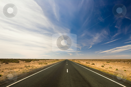 To use this stock image in your creative project, please select the size you need over to the right and click the "Add to Cart" button.
Your downloaded image will come with the Cutcaster watermark removed so don’t worry about the watermark you see on this page. Endless journey stock photo, A road stretches for eternity by Angus Benham