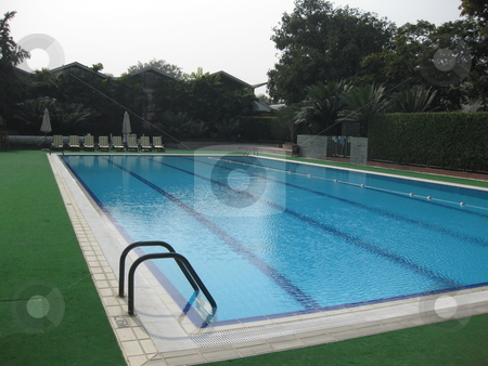To use this stock image in your creative project, please select the size you need over to the right and click the "Add to Cart" button.
Your downloaded image will come with the Cutcaster watermark removed so don’t worry about the watermark you see on this page. Empty Swimming Pool stock photo, An empty Swimming Pool. by Colin Elves